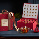 冬季限定紅茶やハーブティー、緑茶、ホワイトティーのティーバッグアソートギフト箱とティーカップ